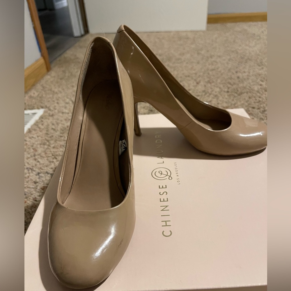 Nude closed toed heels